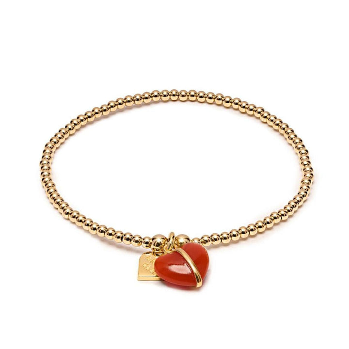 Niche Jewellery Annie Haak Santeenie Imogen stretch bracelet with gold-filled beads and a burnt orange heart charm.