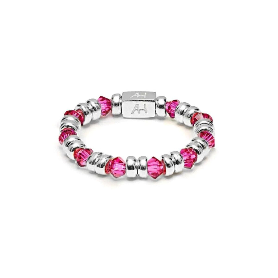 Niche Jewellery Annie Haak Joy ring featuring cerise pink crystals and 925 sterling silver beads with AH logo charm.
