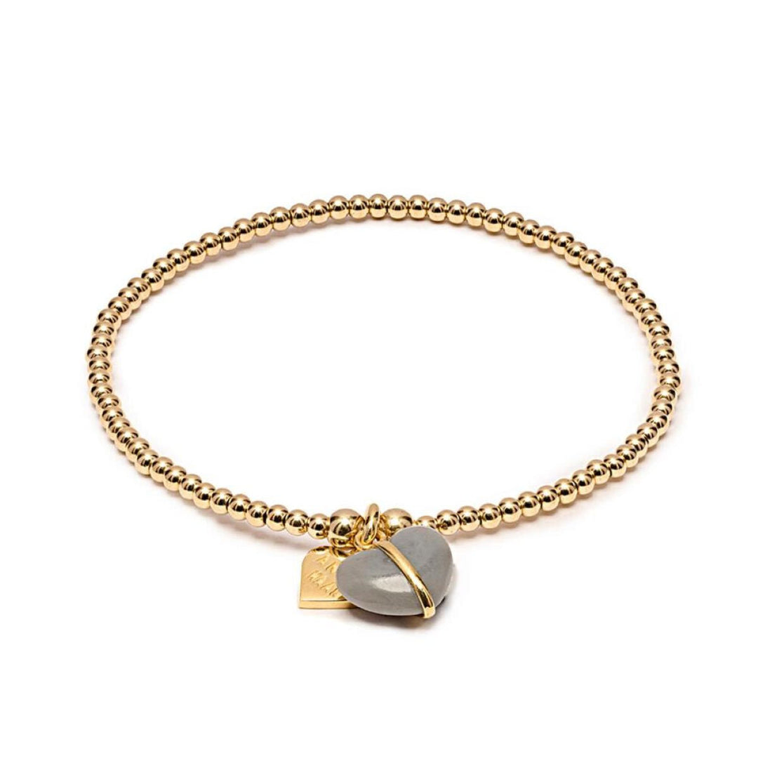 Niche Jewellery Annie Haak gold filled beaded stretch bracelet with a grey heart charm and engraved gold heart tag.