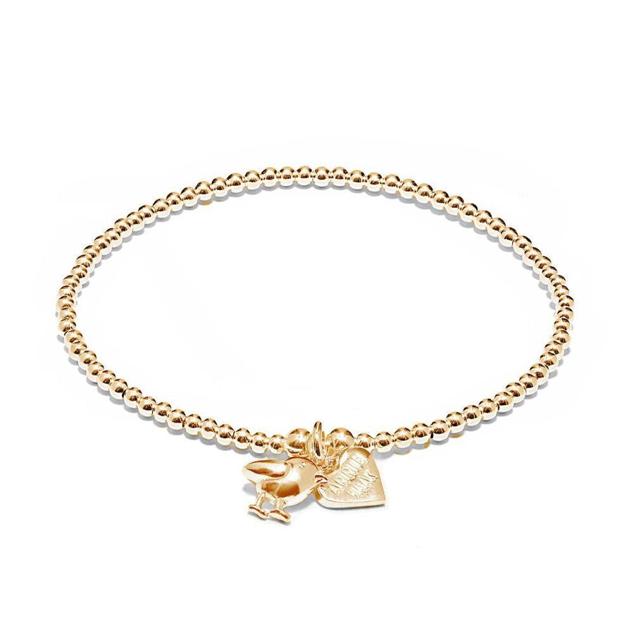 Niche Jewellery Annie Haak gold-plated silver beaded Santeenie bracelet with a delicate robin and heart charm.