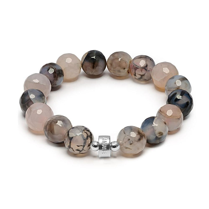 Niche Jewellery Annie Haak Lucia bracelet featuring faceted grey agate beads and a sterling silver logo charm.