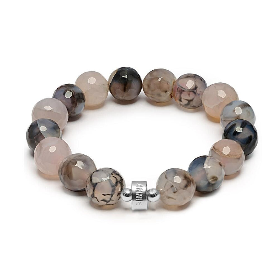 Niche Jewellery Annie Haak Lucia bracelet featuring faceted grey agate beads and a sterling silver logo charm.