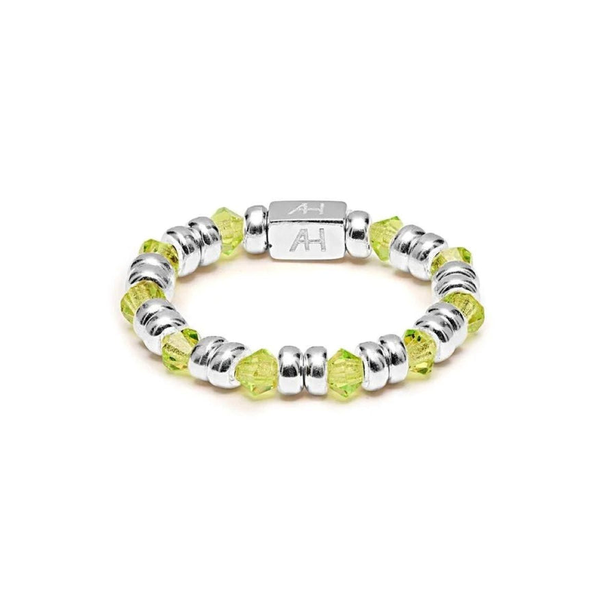 Niche Jewellery Annie Haak Joy ring featuring lime green crystals and 925 sterling silver beads on a stretchy band.