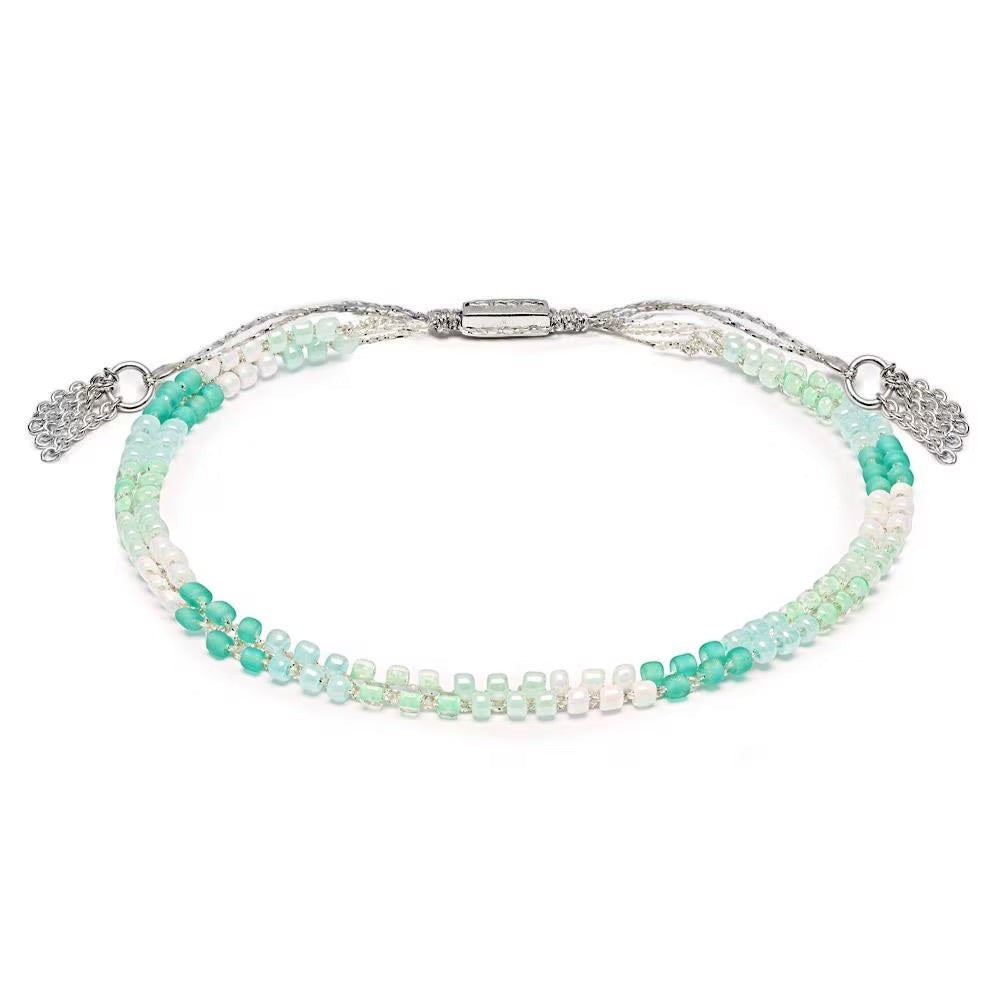 Niche Jewellery Annie Haak Ocean Friendship bracelet with blue and green beads and 925 sterling silver slider clasp.
