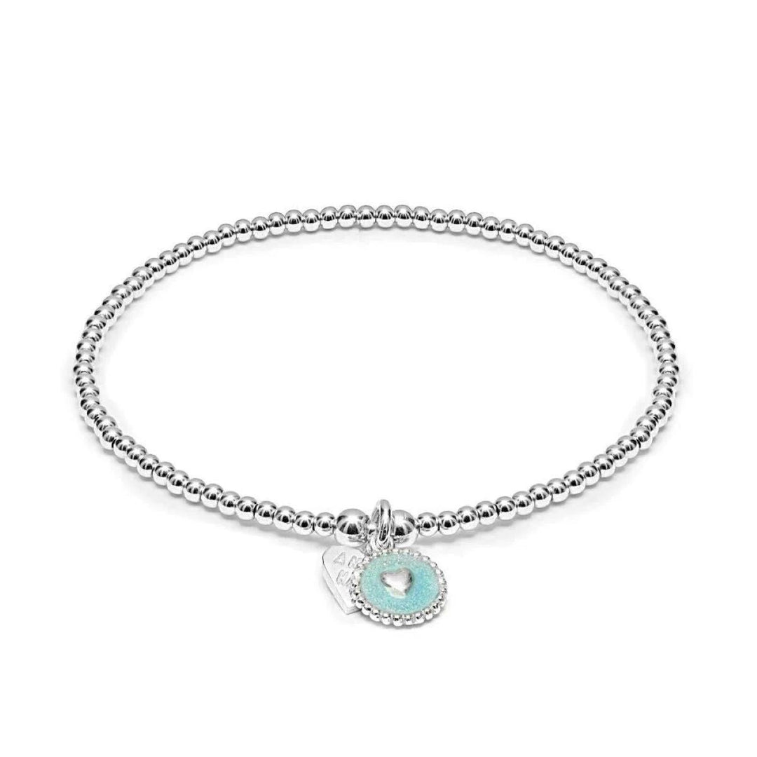 Niche Jewellery Annie Haak Santeenie sterling silver stretch bracelet with a delicate blue heart charm