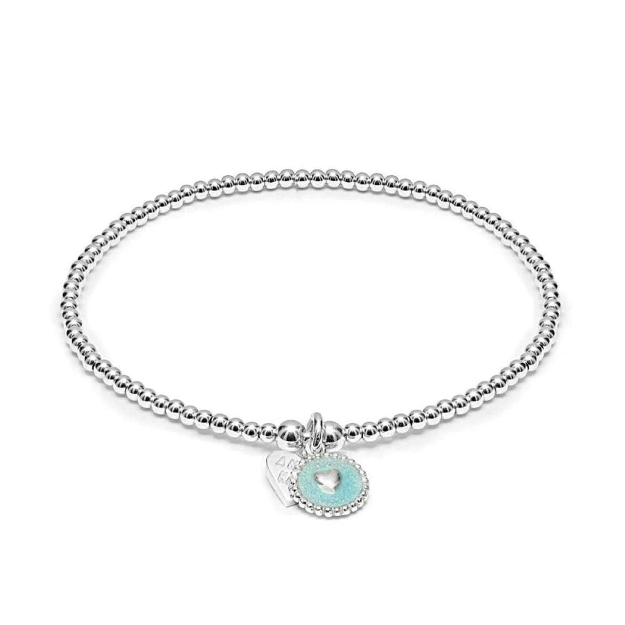 Niche Jewellery Annie Haak Santeenie sterling silver stretch bracelet with a delicate blue heart charm