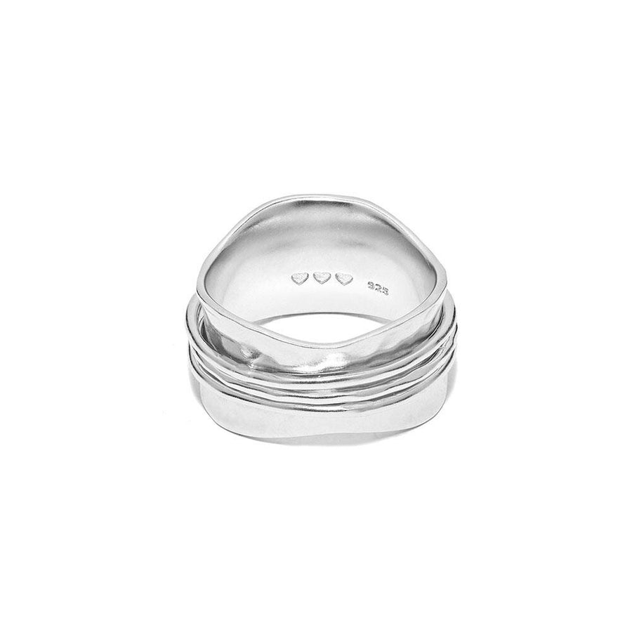 Niche Jewellery Annie Haak Saturn spinner ring in 925 sterling silver with a hammered texture and spinning bands.