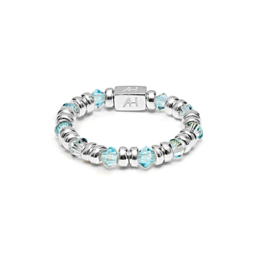 Niche Jewellery Annie Haak Joy ring featuring sky-blue crystals and 925 sterling silver beads with an AH logo charm.