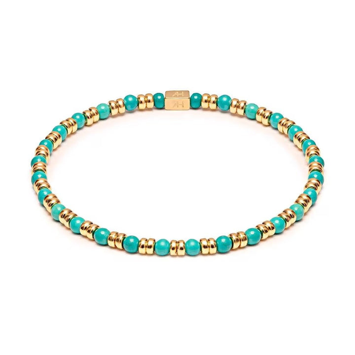 Niche Jewellery Annie Haak Joy stretch bracelet with turquoise howlite beads and gold-plated sterling silver accents.