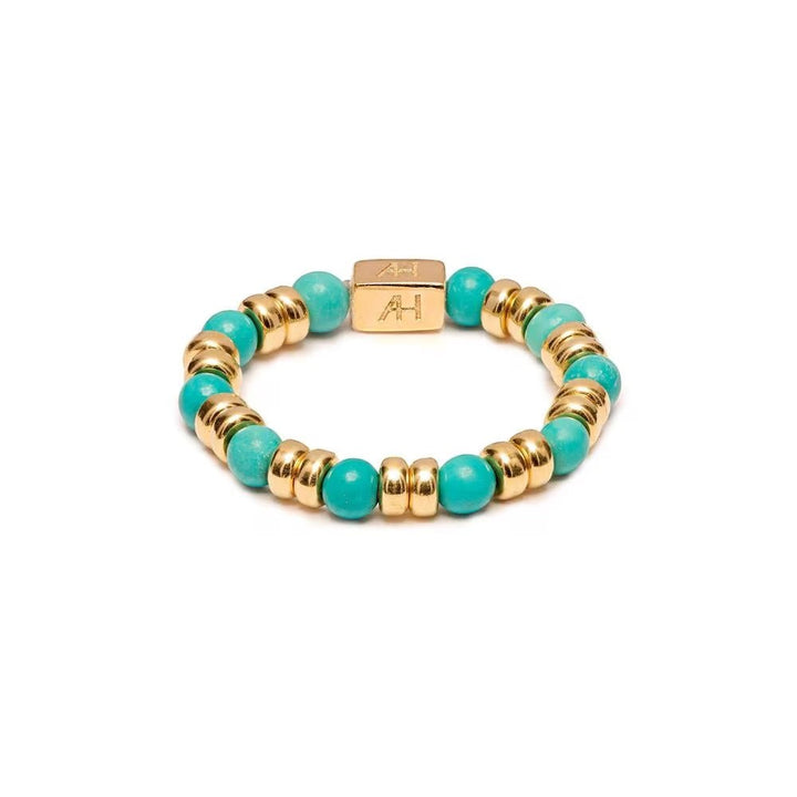 Niche Jewellery Annie Haak Joy stretch ring with turquoise howlite beads and gold-plated sterling silver accents.