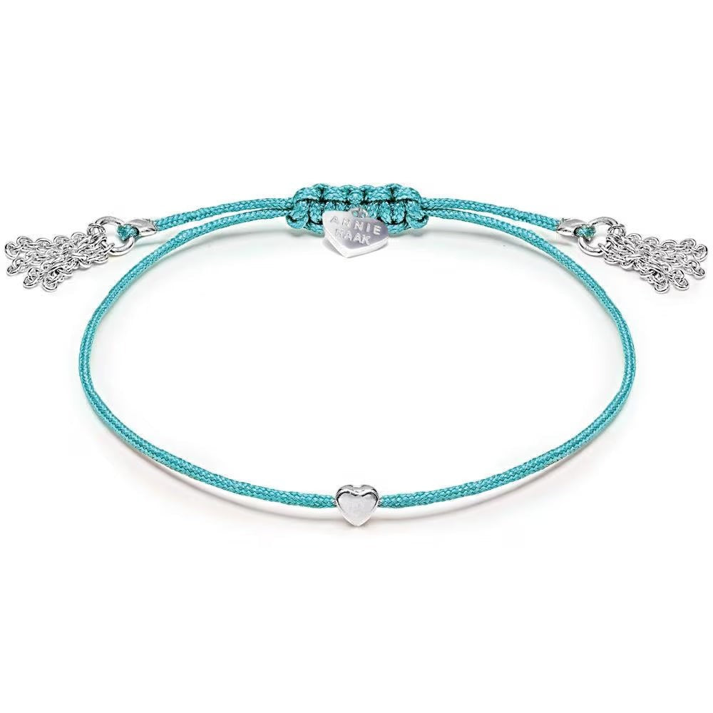 Niche Jewellery Annie Haak Harmony Heart bracelet with turquoise cord and 925 sterling silver heart charm.