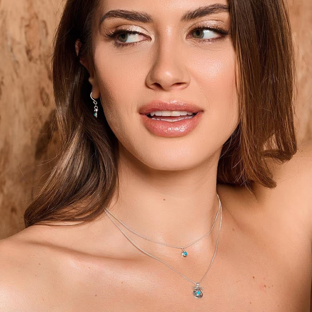 Model wearing Niche Jewellery Annie Haak Itsy Bitsy Mosaic turquoise howlite and sterling silver layered necklace.