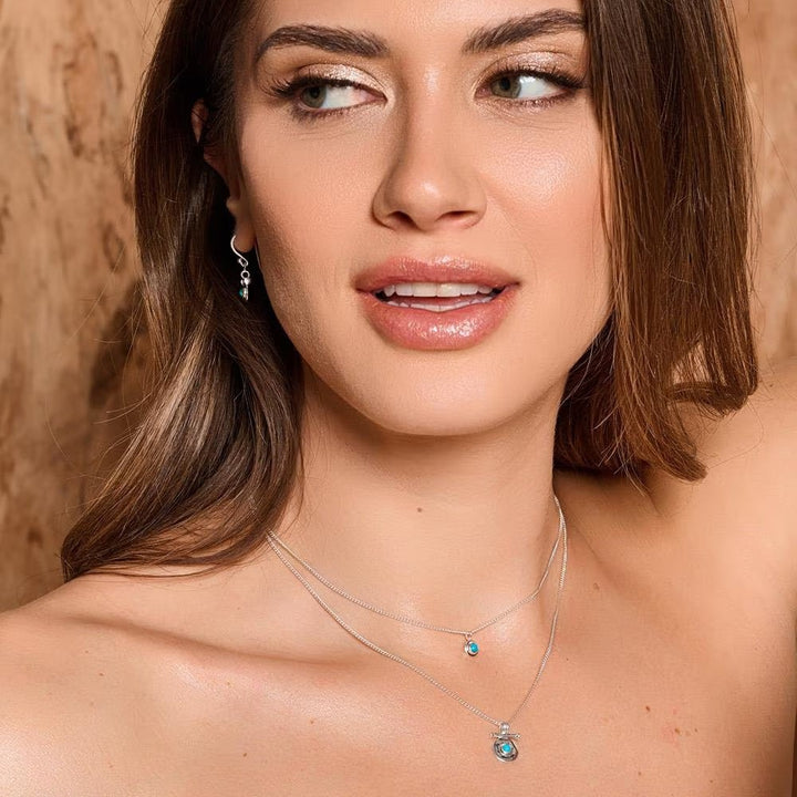 Model wearing Niche Jewellery Annie Haak Itsy Bitsy Mosaic turquoise howlite and sterling silver layered necklace.