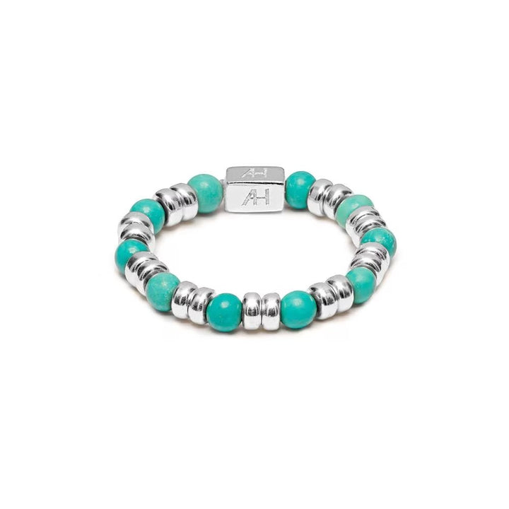 Niche Jewellery Annie Haak Joy stretch ring featuring turquoise howlite and 925 sterling silver beads with AH charm.