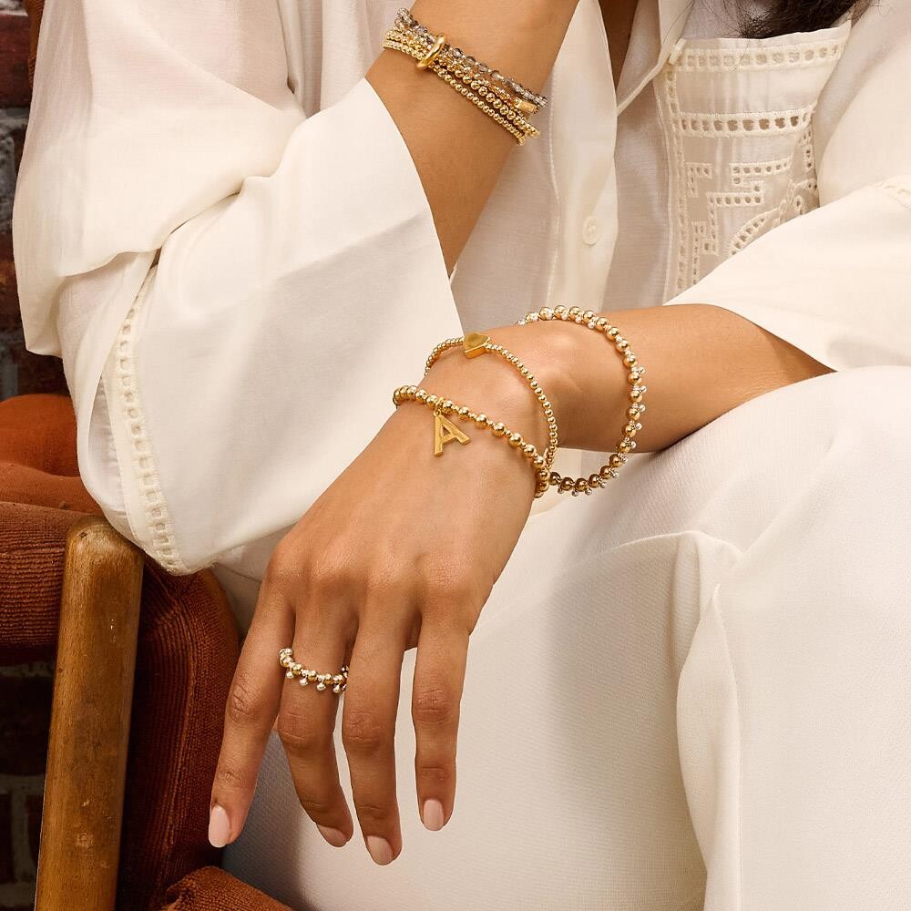 Niche Jewellery Annie Haak Aura bracelet stack featuring two-tone sterling silver and 14ct gold-filled beaded designs.
