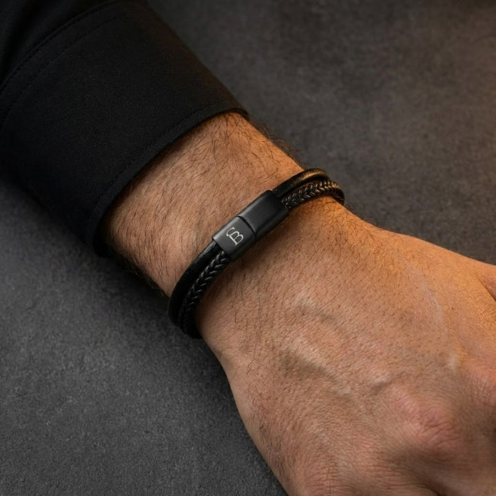 Niche Jewellery Steel & Barnett dual-band black leather bracelet with a matte stainless steel magnetic clasp on wrist