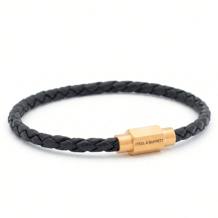 Niche Jewellery Steel & Barnett thin braided black nappa leather bracelet with a gold-plated magnetic clasp.