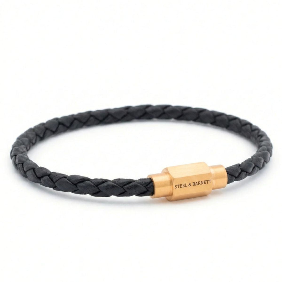 Niche Jewellery Steel & Barnett thin braided black nappa leather bracelet with a gold-plated magnetic clasp.
