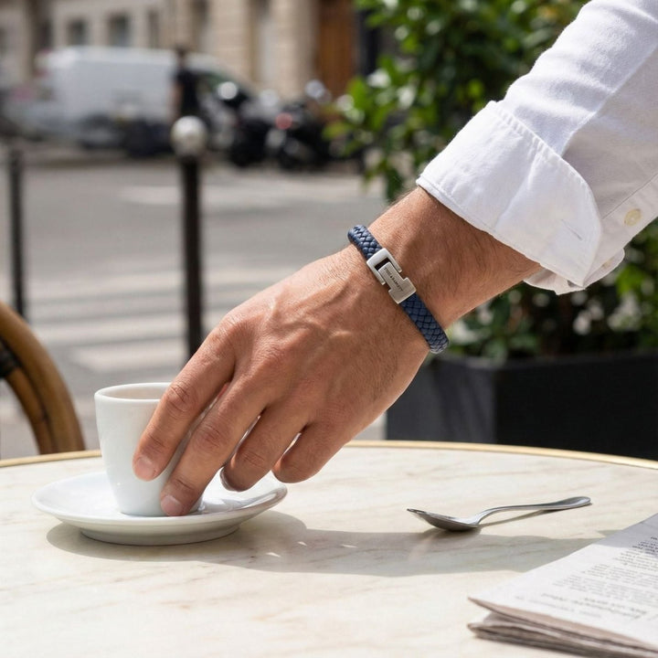 Niche Jewellery Steel & Barnett blue braided nappa leather bracelet with stainless steel clasp on a man's wrist