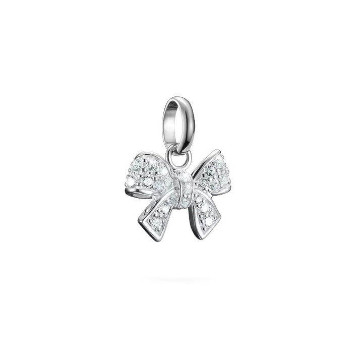 Niche Jewellery sparkling bow charm pendant made from recycled 925 sterling silver with white cubic zirconia stones.