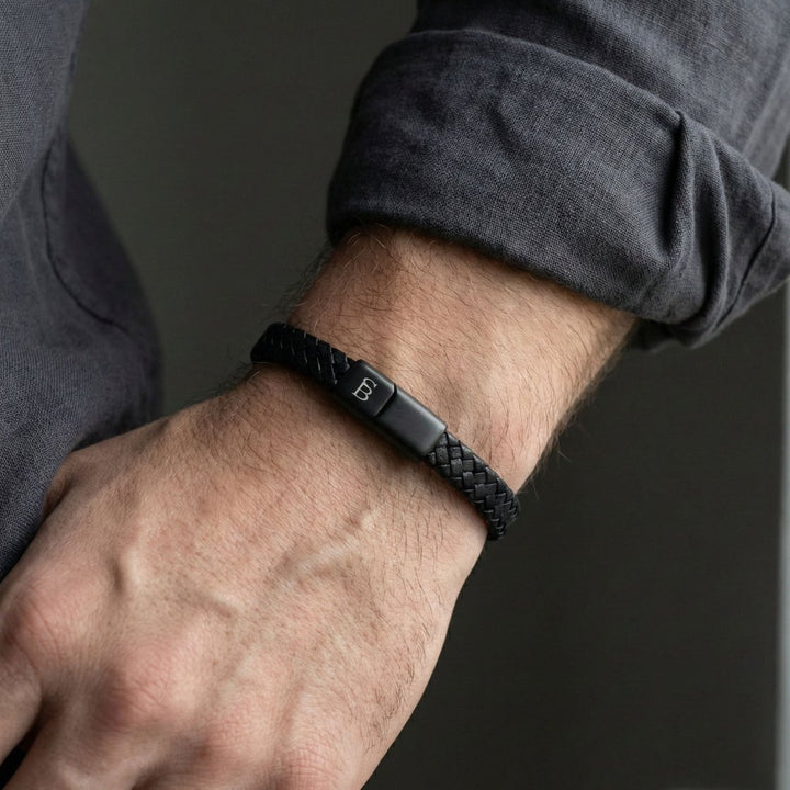 Niche Jewellery Steel & Barnett black braided leather bracelet with a matte stainless steel magnetic clasp on a wrist