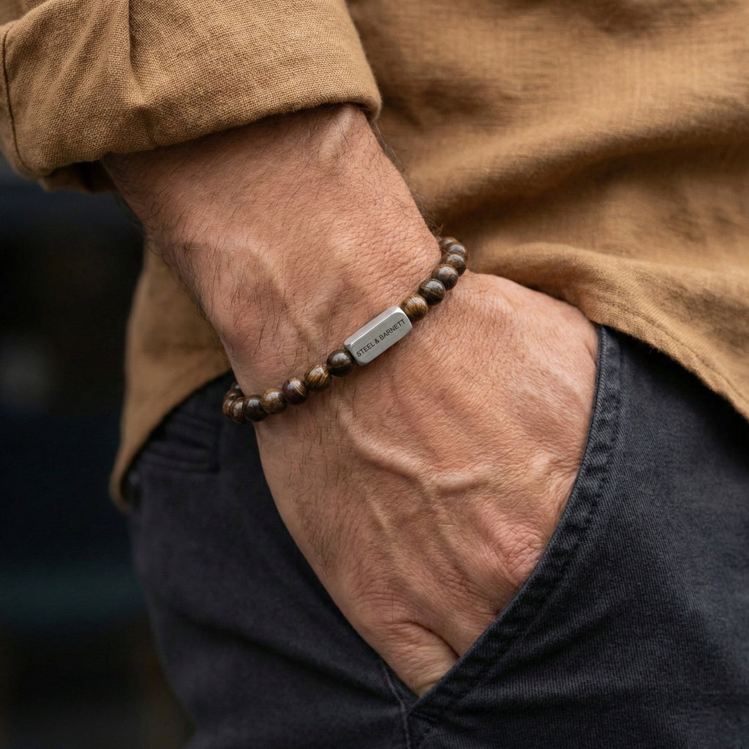 Niche Jewellery Steel & Barnett matte bronzite bead bracelet with stainless steel accent on a man's wrist