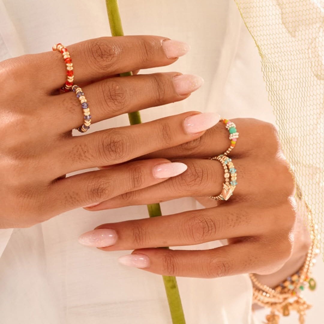 Niche Jewellery Annie Haak Joy cerise crystal and sterling silver beaded ring worn on a model's hand