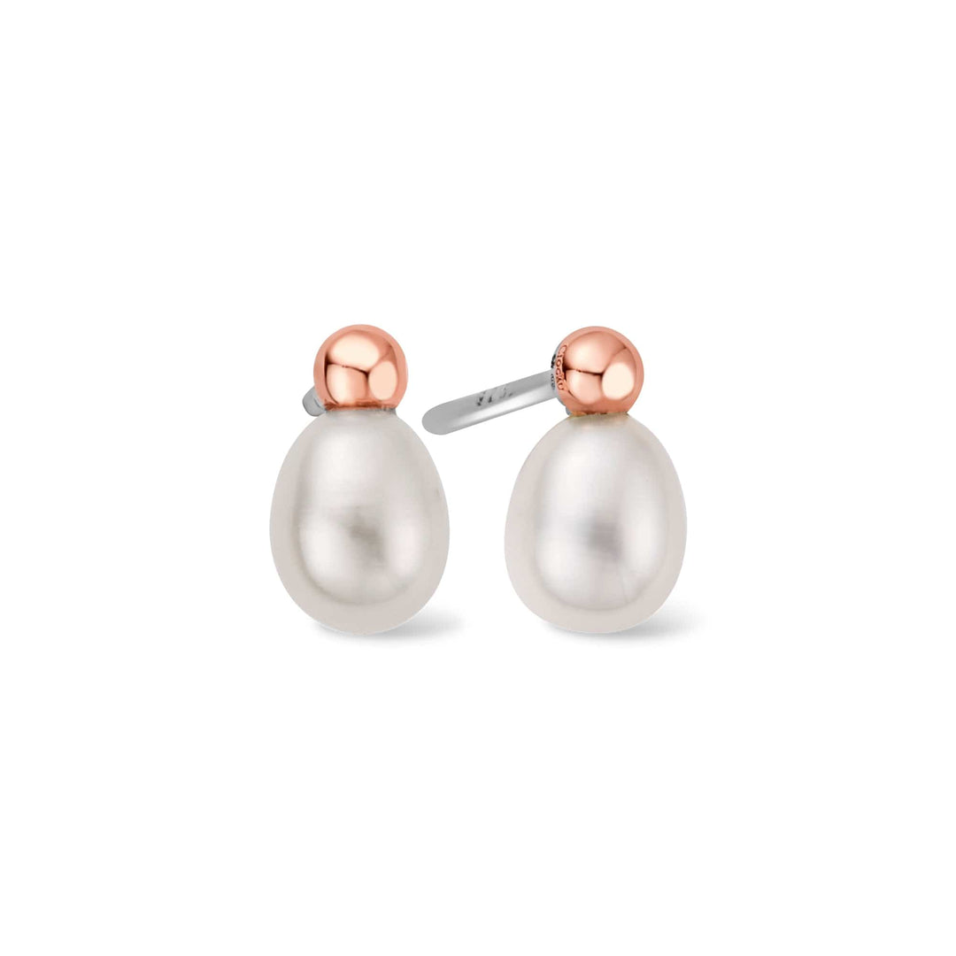 Niche Jewellery Clogau sterling silver stud earrings featuring lustrous freshwater pearls and rose gold accents.