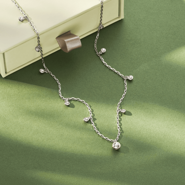 Niche Jewellery Clogau Celebration sterling silver necklace featuring white topaz stones on a delicate chain.