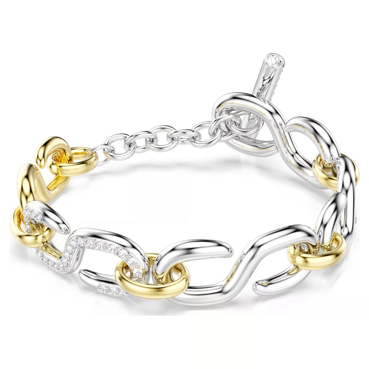 Niche Jewellery Swarovski Dextera bracelet featuring mixed gold and silver tone chain links with white crystals.
