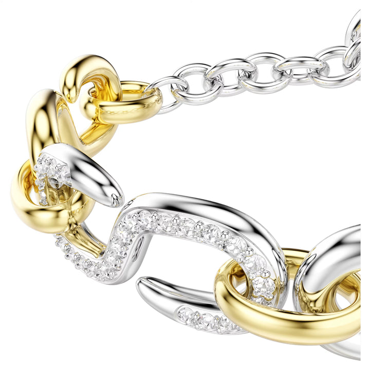 Niche Jewellery Swarovski Dextera bracelet featuring mixed gold and silver tone chain links with white crystal accents.