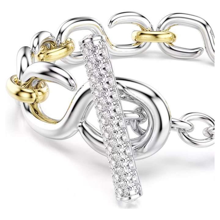 Niche Jewellery Swarovski Dextera bracelet with white crystals, T-bar clasp, and mixed gold and silver tone chain.
