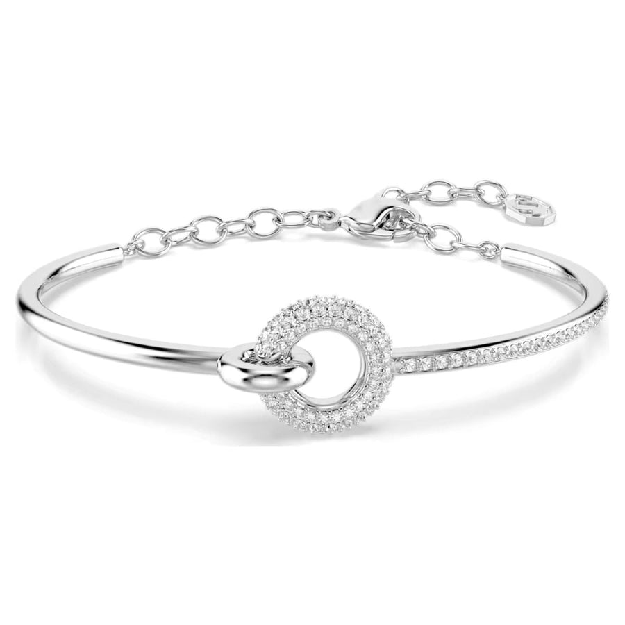 Niche Jewellery Swarovski Dextera bangle featuring a round-cut crystal circle on a rhodium-plated silver band.
