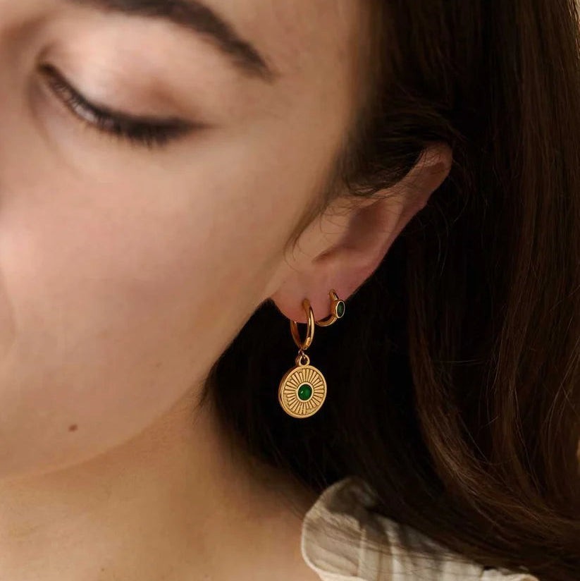 Niche Jewellery Formation Co Boheme emerald hoop earrings in 18k gold plated sterling silver worn on a model
