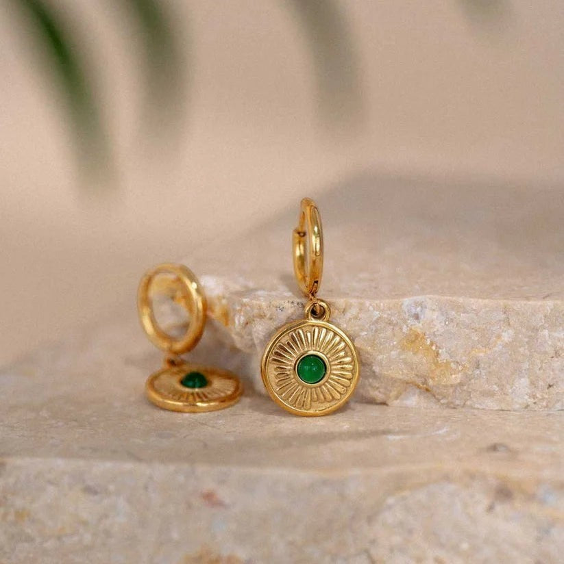 Niche Jewellery Formation Co Boheme emerald hoop earrings in 18k gold plated sterling silver with a sunburst engraved charm.