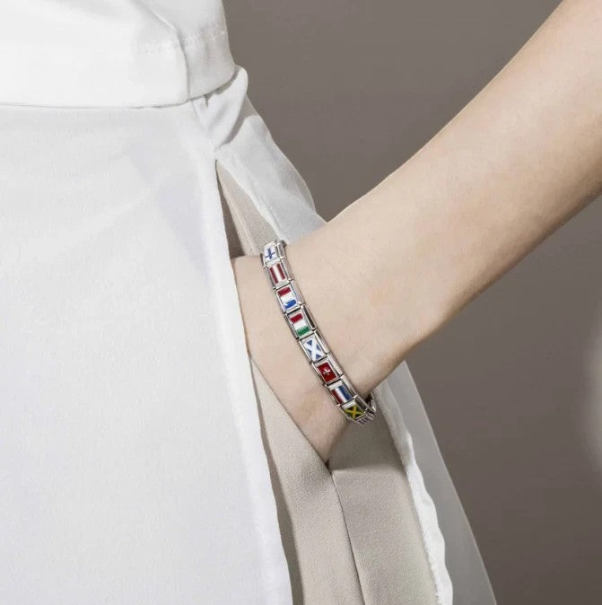 Niche Jewellery Nomination bracelet featuring colourful enamel flag charms on a stainless steel link chain.