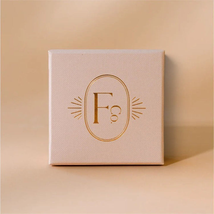Niche Jewellery branded gift box for the Formation Co Gaia Pearl Bracelet in a soft beige textured finish