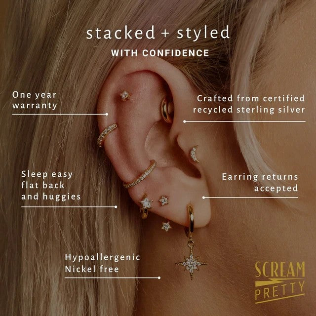 Niche Jewellery Scream Pretty gold baguette flat back earring worn in an elegant ear stack with multiple piercings.