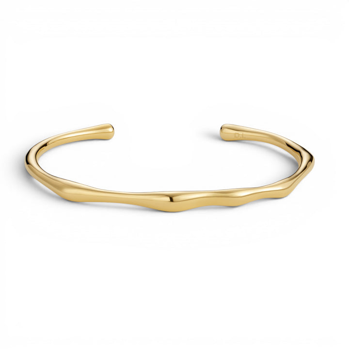 Niche Jewellery gold bamboo-inspired cuff bangle with a unique, organic wavy design. Waterproof and tarnish-free.