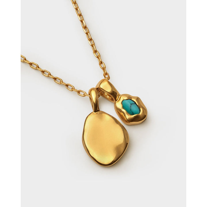 Niche Jewellery Katie Loxton gold-tone necklace with a blue December birthstone charm and organic gold pendant.