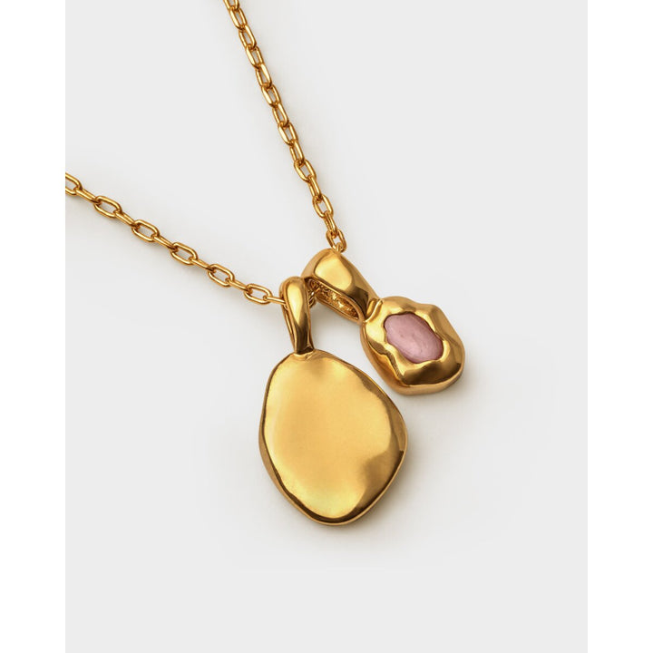 Niche Jewellery Katie Loxton gold waterproof necklace featuring a pink October birthstone and organic pendant charm.