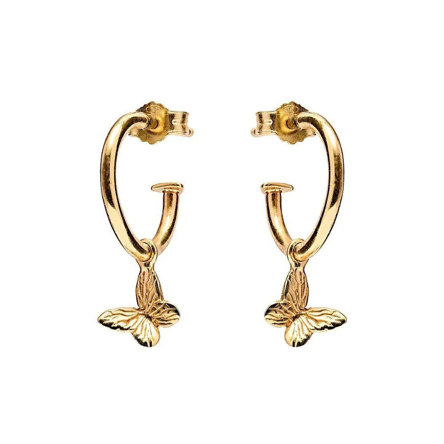 Niche Jewellery Annie Haak gold-plated silver hoop earrings featuring dainty butterfly charms for a delicate look.