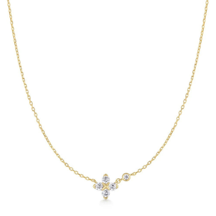 Niche Jewellery Ania Haie gold-plated sterling silver necklace featuring a sparkling cubic zirconia clover pendant.