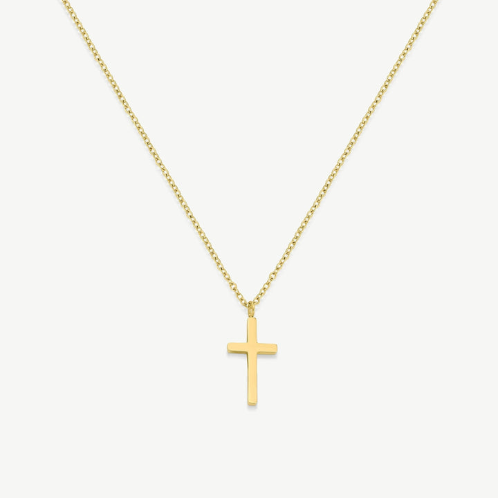Niche Jewellery D.Louise gold cross pendant necklace on a fine chain, crafted from waterproof stainless steel.