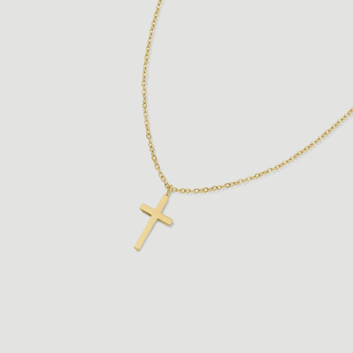Niche Jewellery D.Louise gold cross pendant necklace on a fine tarnish-free stainless steel chain