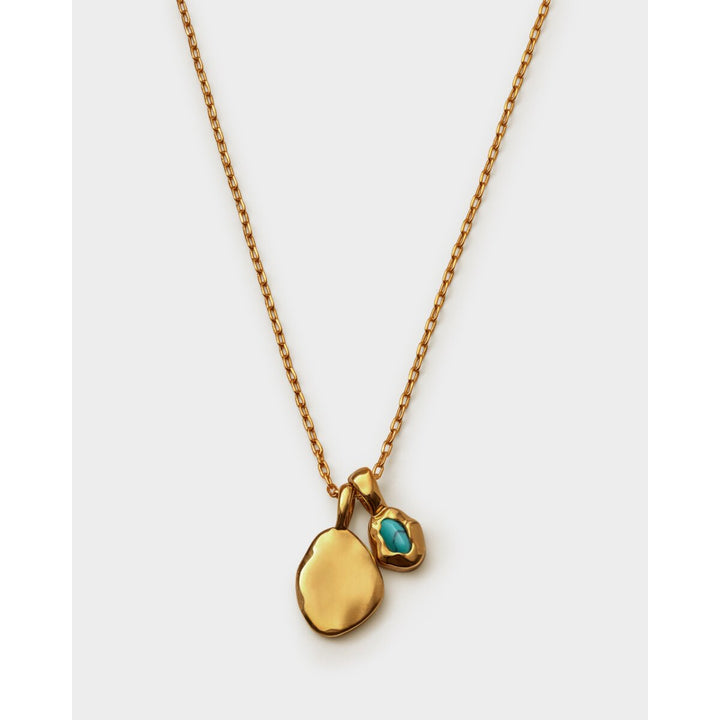 Niche Jewellery Katie Loxton gold-tone December birthstone necklace with a blue stone and organic pendant charm.