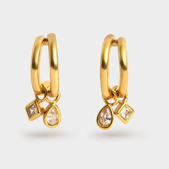 Niche Jewellery Katie Loxton gold-tone waterproof drop earrings featuring double hoops and sparkling crystal charms.