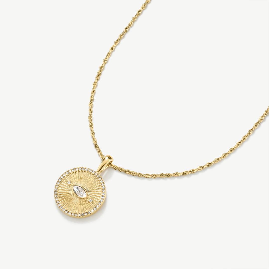 Niche Jewellery gold evil eye talisman necklace with sunburst design and clear stones, waterproof and tarnish-free.