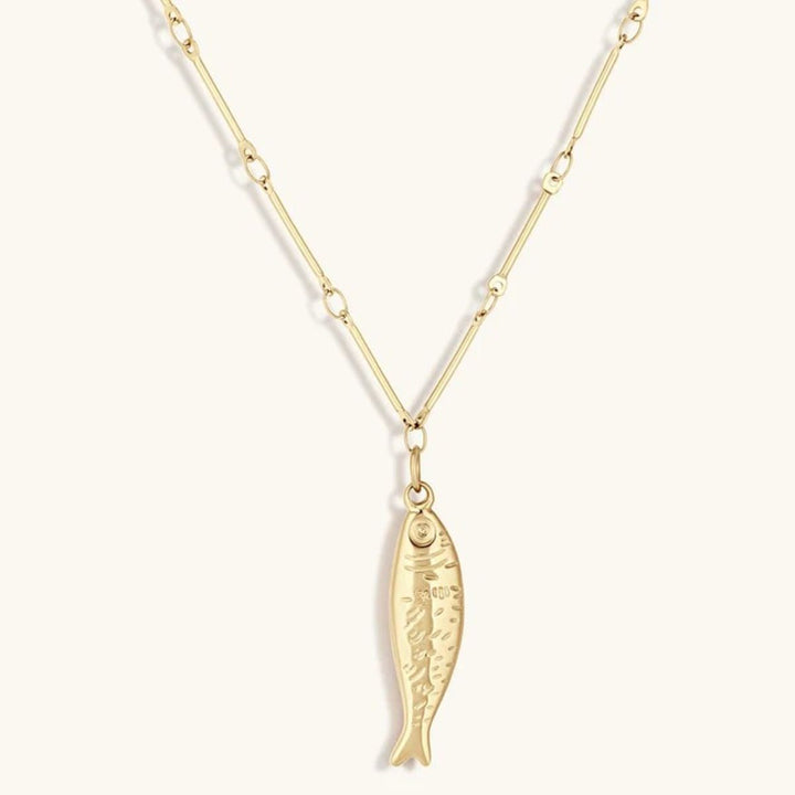 Niche Jewellery Formation Co gold-plated Selkie fish pendant necklace with a unique bar and link chain.