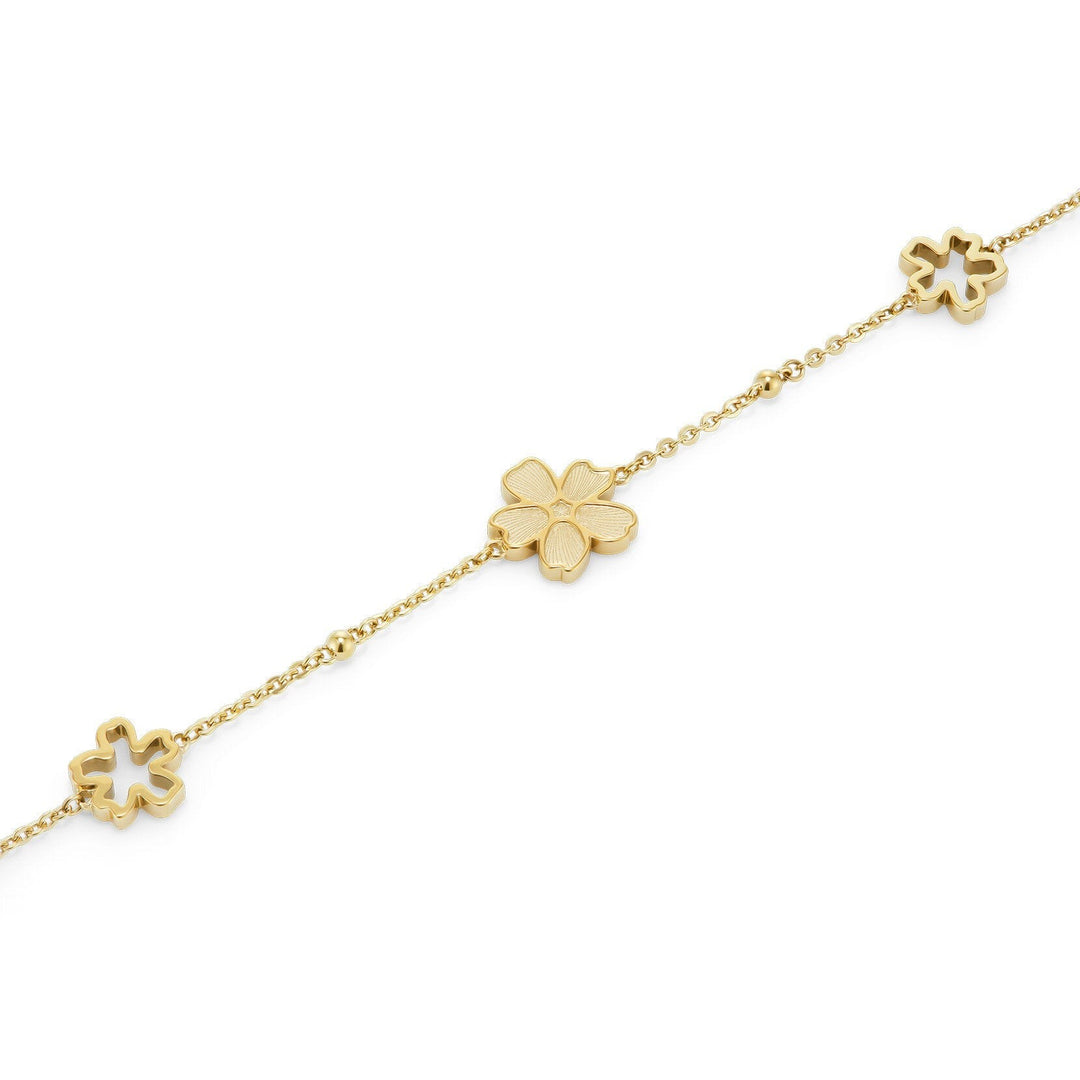 Niche Jewellery Olivia Burton gold-plated bracelet featuring delicate forget-me-not flower charms on a fine chain.